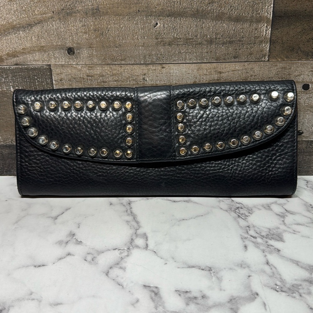 Vintage leather Brave clutch